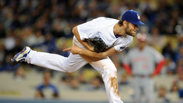 May 23, 2016; Los Angeles, CA, USA; Los Angeles Dodgers starting pitcher Clayton Kershaw (22) throws in the ninth inning against Cincinnati Reds at Dodger Stadium. Mandatory Credit: Gary A. Vasquez-USA TODAY Sports