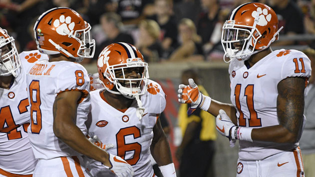 Sep 16, 2017; Louisville, KY, USA; Clemson Tigers linebacker Dorian O'Daniel (6) celebrates with teammates after scoring a defensive touchdown against the Louisville Cardinals during the second half at Papa John's Cardinal Stadium. Clemson defeated Louisville 47-21. Photo Credit: Jamie Rhodes-USA TODAY Sports