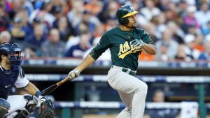 A’s blank Tigers behind LHP Anderson, Crisp’s catch