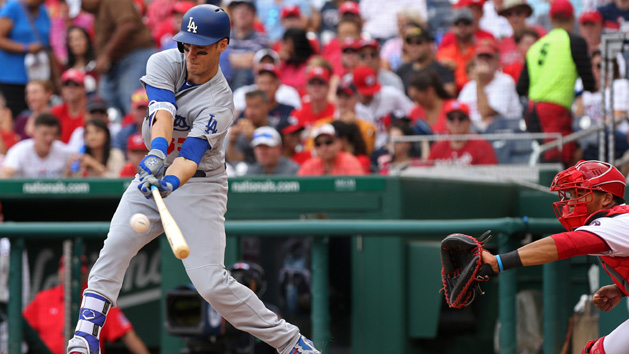 Sep 16, 2017; Washington, DC, USA; Los Angeles Dodgers first baseman Cody Bellinger (35) singles in a run against the Washington Nationals in the third inning at Nationals Park. Mandatory Credit: Geoff Burke-USA TODAY Sports