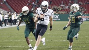 Memphis beats USF, keeps alive CFP Bowl hopes