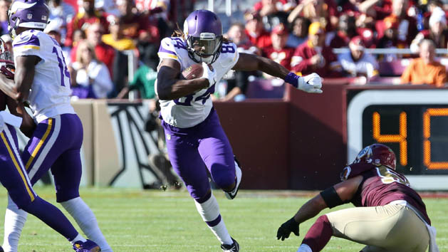 Nov 13, 2016; Landover, MD, USA; Minnesota Vikings wide receiver Cordarrelle Patterson (84) runs with the ball past Washington Redskins linebacker Will Compton (51) in the first quarter at FedEx Field. Photo Credit: Geoff Burke-USA TODAY Sports