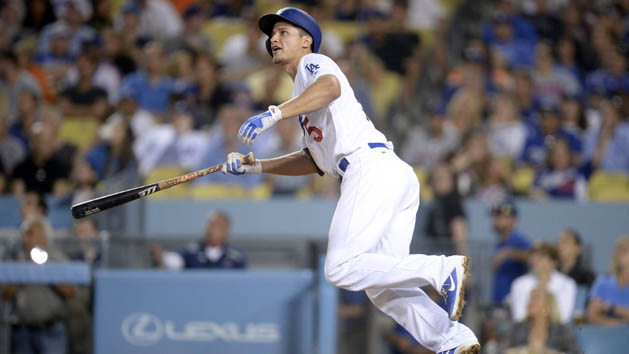 Jun 20, 2017; Los Angeles, CA, USA; Los Angeles Dodgers shortstop Corey Seager (5) hits a solo home run in the fourth inning against the New York Mets at Dodger Stadium. Photo Credit: Gary A. Vasquez-USA TODAY Sports