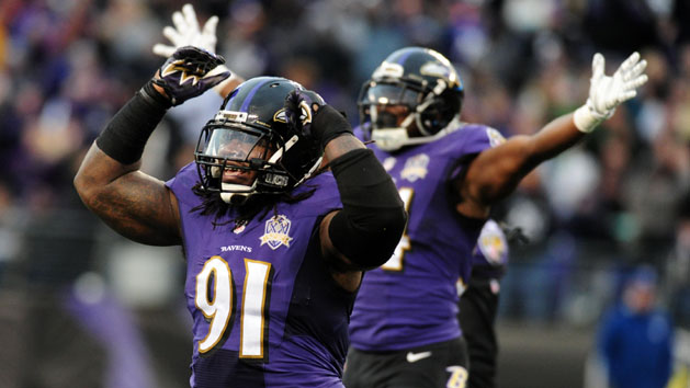 Nov 22, 2015; Baltimore, MD, USA; Baltimore Ravens linebacker Courtney Upshaw (91) celebrates in the fourth quarter against the St. Louis Rams at M&T Bank Stadium. Mandatory Credit: Evan Habeeb-USA TODAY Sports