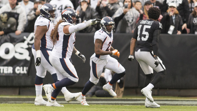 Nov 26, 2017; Oakland, CA, USA; Oakland Raiders wide receiver Michael Crabtree (15) taunts Denver Broncos cornerback Aqib Talib (21) after the incident on the sidelines during the first quarter at Oakland Coliseum. Photo Credit: Neville E. Guard-USA TODAY Sports