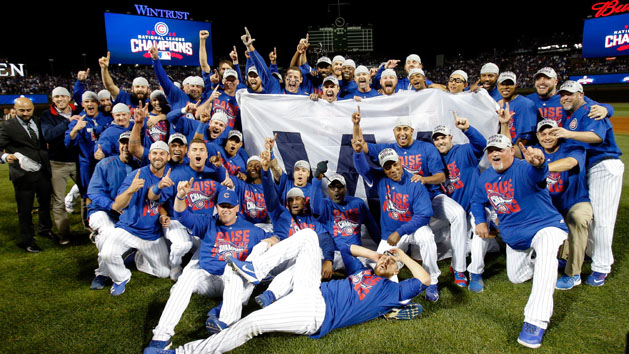 Oct 22, 2016; Chicago, IL, USA; The Chicago Cubs pose for a photo on the pitcher's mound after winning game six of the 2016 NLCS playoff baseball series at Wrigley Field. The Chicago Cubs advance to the World Series. Photo Credit:
