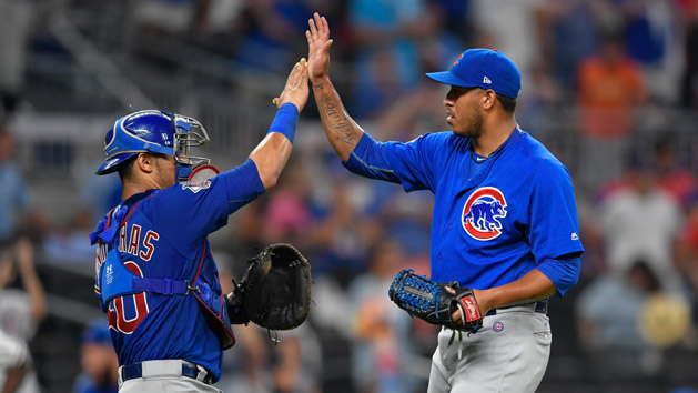 Jul 18, 2017; Atlanta, GA, USA; Chicago Cubs relief pitcher Hector Rondon (56) and catcher Willson Contreras (40) react after defeating the Atlanta Braves at SunTrust Park. Photo Credit: Dale Zanine-USA TODAY Sports