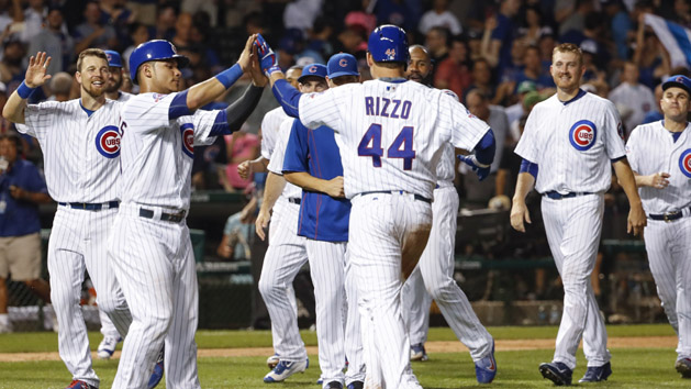 Aug 11, 2016; Chicago, IL, USA; Chicago Cubs first baseman Anthony Rizzo (44) celebrates with teammates after walk off walk against the St. Louis Cardinals during the eleventh inning at Wrigley Field. The Cubs won 4-3. Photo Credit: Kamil Krzaczynski-USA TODAY Sports