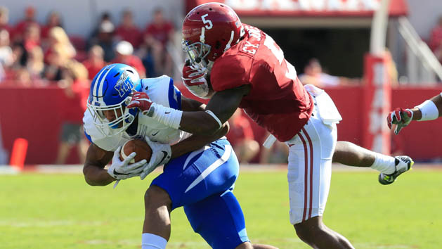 Sep 12, 2015; Tuscaloosa, AL, USA; DUPLICATE***Alabama Crimson Tide defensive back Cyrus Jones (5) tackles Middle Tennessee Blue Raiders running back Jordan Parker (6)at Bryant-Denny Stadium. Mandatory Credit: Marvin Gentry-USA TODAY Sports
