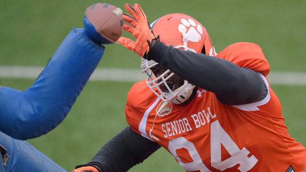 Jan 27, 2016; Mobile, AL, USA; South squad defensive tackle D.J. Reader of Clemson (94) hits a tackling dummy in a drill during Senior Bowl practice at Ladd-Peebles Stadium. Mandatory Credit: Glenn Andrews-USA TODAY Sports