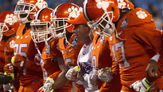 Dec 5, 2015; Charlotte, NC, USA; Clemson Tigers head coach Dabo Swinney (C) and his team prior to their ACC football championship game against the North Carolina Tar Heels at Bank of America Stadium. Photo Credit: Joshua S. Kelly-USA TODAY Sports
