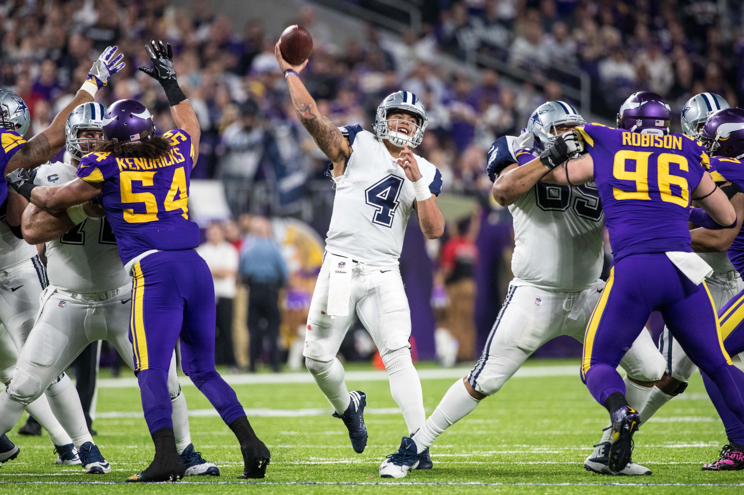 Dec 1, 2016; Minneapolis, MN, USA; Dallas Cowboys quarterback Dak Prescott (4) throws during the fourth quarter against the Minnesota Vikings at U.S. Bank Stadium. The Cowboys defeated the Vikings 17-15. Photo Credit: Brace Hemmelgarn-USA TODAY Sports