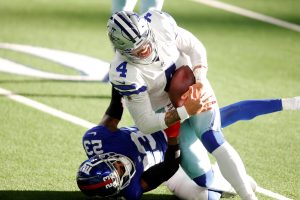 Dallas QB Prescott carted off with leg injury