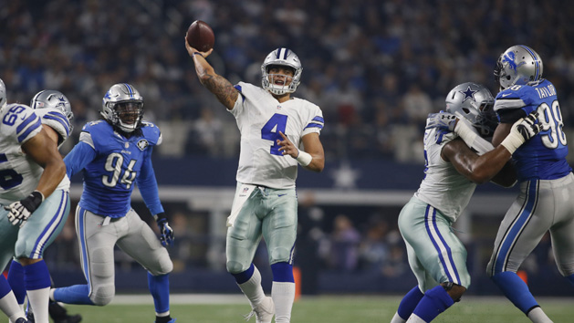Dec 26, 2016; Arlington, TX, USA; Dallas Cowboys quarterback Dak Prescott (4) throws a touchdown pass in the second quarter against the Detroit Lions at AT&T Stadium. Photo Credit: Tim Heitman-USA TODAY Sports