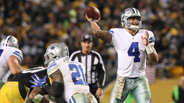 Oct 9, 2016; Arlington, TX, USA; Dallas Cowboys quarterback Dak Prescott (4) runs for a touchdown in the second quarter against the Cincinnati Bengals at AT&T Stadium. Photo Credit: Matthew Emmons-USA TODAY Sports