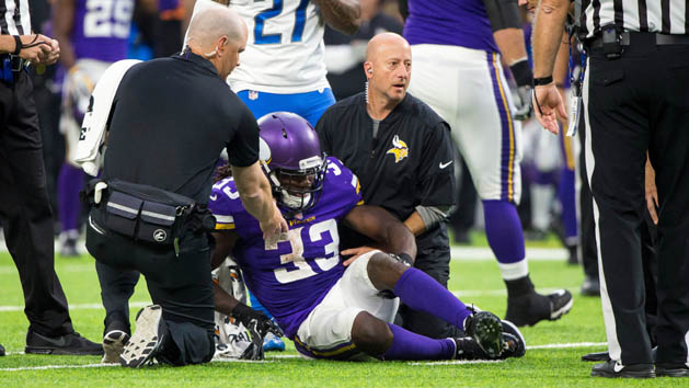 Oct 1, 2017; Minneapolis, MN, USA; Minnesota Vikings running back Dalvin Cook (33) holds his knee after being tackled in the third quarter against the Detroit Lions at U.S. Bank Stadium. Photo Credit: Brad Rempel-USA TODAY Sports