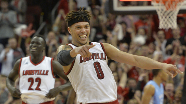 Feb 1, 2016; Louisville, KY, USA; Louisville Cardinals guard Damion Lee (0) celebrates after defeating the North Carolina Tar Heels 71-65 at KFC Yum! Center. Photo Credit: Jamie Rhodes-USA TODAY Sports