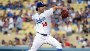 Dodgers charge into first place