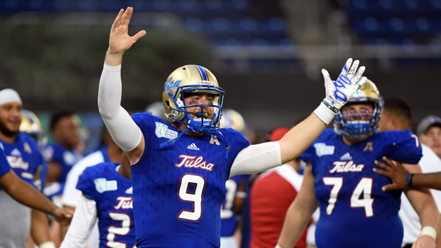 Dec 19, 2016; Miami, FL, USA; Tulsa Golden Hurricane quarterback Dane Evans (9) celebrates after Tulsa Golden Hurricane defensive tackle Jesse Brubaker (not pictured) made an interception catch for a touchdown during the second half against Central Michigan Chippewas at Marlins Park. Photo Credit: Steve Mitchell-USA TODAY Sports