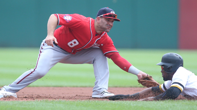 Jul 26, 2015; Pittsburgh, PA, USA; Washington Nationals second baseman Danny Espinosa (8) tags out Pittsburgh Pirates left fielder Starling Marte (R) attempting to steal second base during the first inning at PNC Park. Mandatory Credit: Charles LeClaire-USA TODAY Sports