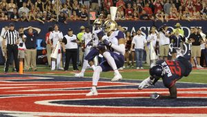No. 9 Huskies survive Wildcats in overtime