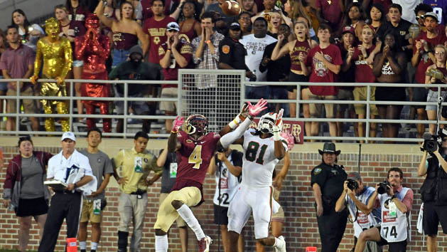 Oct 7, 2017; Tallahassee, FL, USA; Miami Hurricanes wide receiver Darrell Langham (81) scores a go ahead touchdown past Florida State Seminoles defensive back Tavarus McFadden (4) at Doak Campbell Stadium. Photo Credit: Melina Vastola-USA TODAY Sports