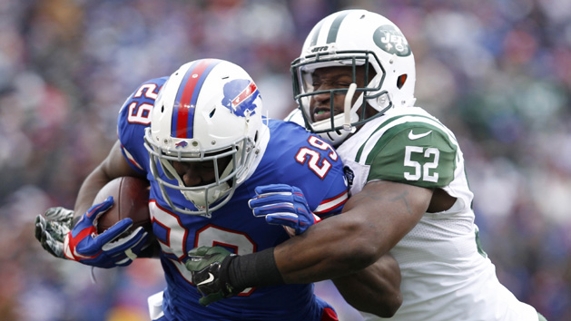 Jan 3, 2016; Orchard Park, NY, USA; New York Jets inside linebacker David Harris (52) tackles Buffalo Bills running back Karlos Williams (29) as he runs the ball during the first half at Ralph Wilson Stadium. Photo Credit: Timothy T. Ludwig-USA TODAY Sports