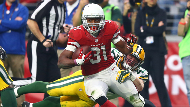 Dec 27, 2015; Glendale, AZ, USA; Arizona Cardinals running back David Johnson (31) is tackled by diving Green Bay Packers linebacker Jake Ryan (47) in the first half at University of Phoenix Stadium. The Cardinals defeated the Packers 38-8. Mandatory Credit: Mark J. Rebilas-USA TODAY Sports