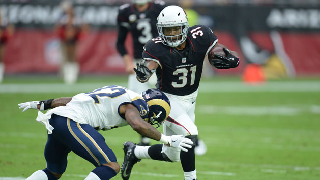Oct 2, 2016; Glendale, AZ, USA; Los Angeles Rams cornerback Troy Hill (32) attempts to tackle Arizona Cardinals running back David Johnson (31) during the first half at University of Phoenix Stadium. Photo Credit: Joe Camporeale-USA TODAY Sports
