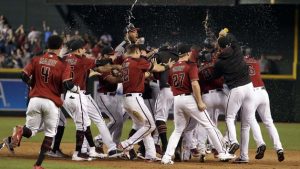 D-backs beat Marlins, clinch top wild-card spot