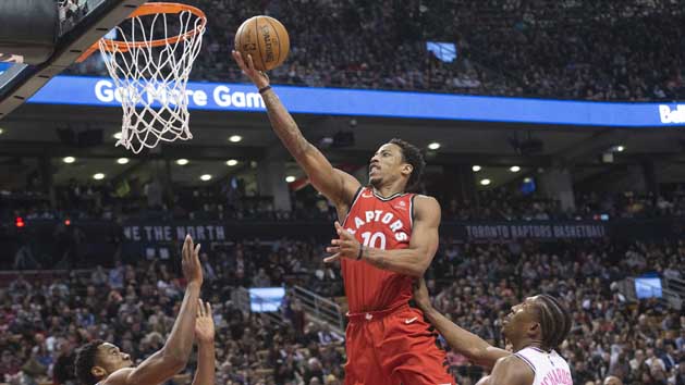 Feb 13, 2018; Toronto, Ontario, CAN; Toronto Raptors guard DeMar DeRozan (10) drives to the basket over Miami Heat forward Josh Richardson (0) during the third quarter at Air Canada Centre. Photo Credit: Nick Turchiaro-USA TODAY Sports