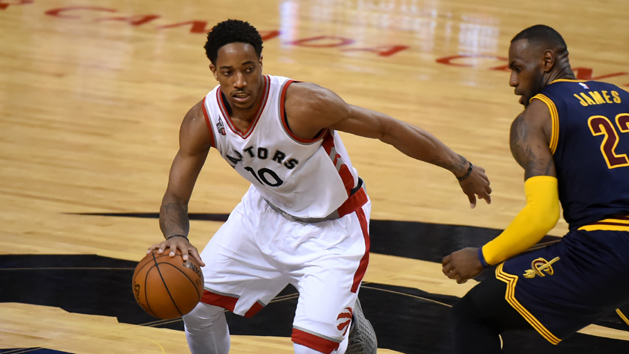 May 21, 2016; Toronto, Ontario, CAN; Toronto Raptors guard DeMar DeRozan (10) dribbles the ball past Cleveland Cavaliers forward LeBron James (23) in game three of the Eastern conference finals of the NBA Playoffs at Air Canada Centre. Mandatory Credit: Dan Hamilton-USA TODAY Sports