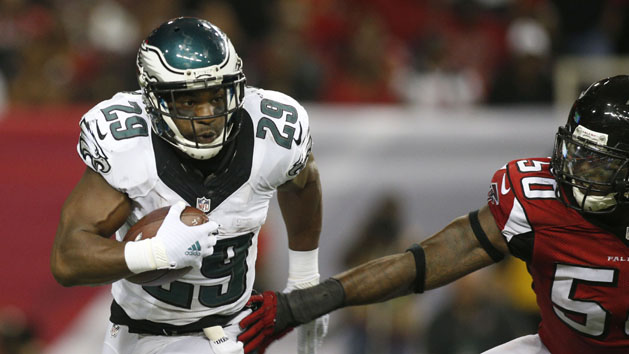 Sep 14, 2015; Atlanta, GA, USA; Philadelphia Eagles running back DeMarco Murray (29) carries the ball past Atlanta Falcons linebacker O'Brien Schofield (50) in the third quarter at the Georgia Dome. Mandatory Credit: Brett Davis-USA TODAY Sports
