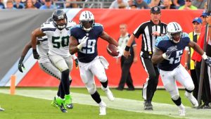 Titans overcome sputtering start, outslug Seahawks