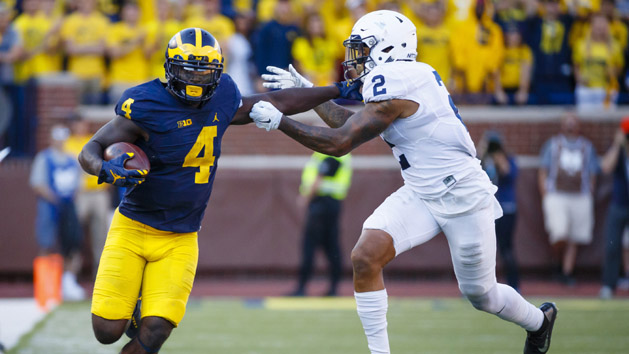 Sep 24, 2016; Ann Arbor, MI, USA; Michigan Wolverines running back De'Veon Smith (4) rushes against Penn State Nittany Lions safety Marcus Allen (2) in the second half at Michigan Stadium. Michigan 49-10. Photo Credit: Rick Osentoski-USA TODAY Sports