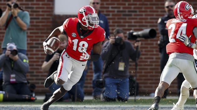 Nov 25, 2017; Atlanta, GA, USA; Georgia Bulldogs defensive back Deandre Baker (18) returns an interception against the Georgia Tech Yellow Jackets in the third quarter at Bobby Dodd Stadium. Photo Credit: Brett Davis-USA TODAY Sports