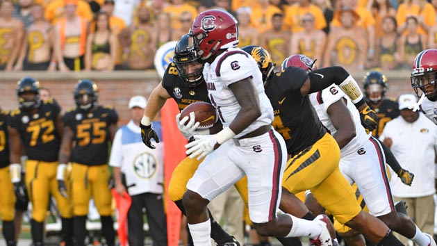 Sep 9, 2017; Columbia, MO, USA; South Carolina Gamecocks wide receiver Deebo Samuel (1) returns a kick off for a touchdown as Missouri Tigers linebacker Eric Beisel (38) attempts the tackle during the first half at Faurot Field. Photo Credit: Denny Medley-USA TODAY Sports