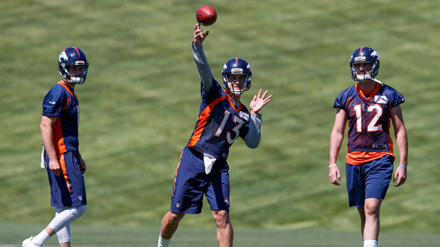 Jun 13, 2017; Englewood, CO, USA; Denver Broncos quarterback Kyle Sloter (1) and quarterback Paxton Lynch (12) watch as quarterback Trevor Siemian (13) throws a pass during minicamp at UCHealth Training Center. Photo Credit: Isaiah J. Downing-USA TODAY Sports