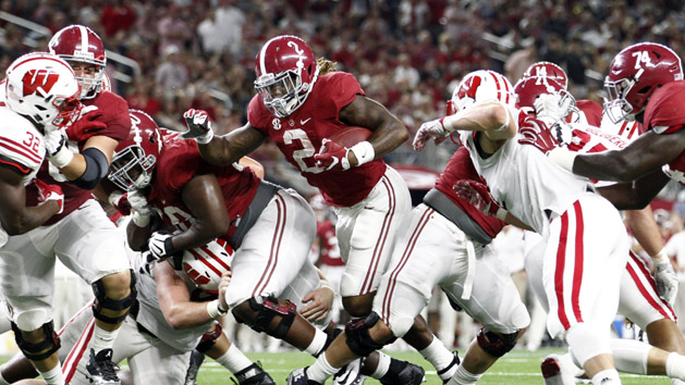 Sep 5, 2015; Arlington, TX, USA; Alabama Crimson Tide running back Derrick Henry (2) scores a touchdown against the Wisconsin Badgers during the third quarter at AT&T Stadium. (Tim Heitman-USA TODAY Sports)