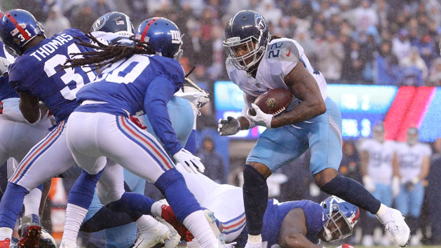Dec 16, 2018; East Rutherford, NJ, USA; Tennessee Titans running back Derrick Henry (22) runs for a touchdown against New York Giants cornerback Janoris Jenkins (20) during the first quarter at MetLife Stadium. Photo Credit: Brad Penner-USA TODAY Sports