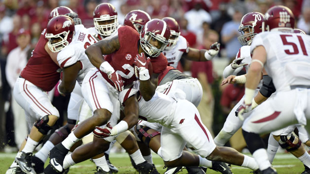 Oct 10, 2015; Tuscaloosa, AL, USA; Alabama Crimson Tide running back Derrick Henry (2) carries against the Arkansas Razorbacks during the first quarter at Bryant-Denny Stadium. Mandatory Credit: John David Mercer-USA TODAY Sports