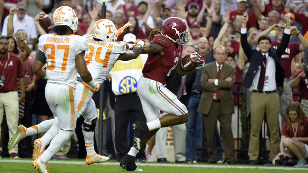 Oct 24, 2015; Tuscaloosa, AL, USA; Alabama Crimson Tide running back Derrick Henry (2) carries for a touchdown against Tennessee Volunteers linebacker Darrin Kirkland Jr. (34) during the fourth quarter at Bryant-Denny Stadium. Mandatory Credit: John David Mercer-USA TODAY Sports