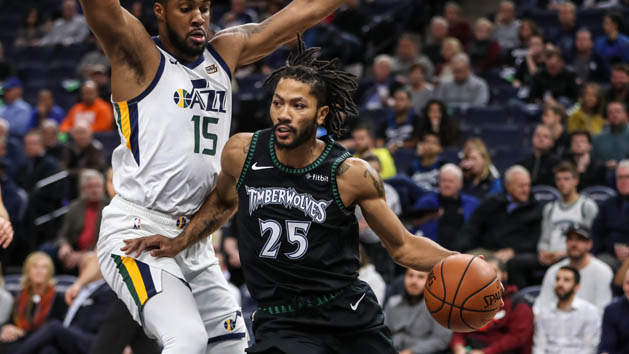 Oct 31, 2018; Minneapolis, MN, USA; Minnesota Timberwolves guard Derrick Rose (25) dribbles past Utah Jazz forward Derrick Favors (15) during the first quarter at Target Center. Photo Credit: Brace Hemmelgarn-USA TODAY Sports