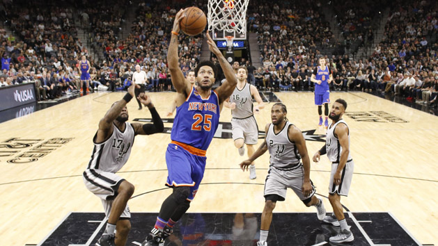 Mar 25, 2017; San Antonio, TX, USA; New York Knicks point guard Derrick Rose (25) drives to the basket past San Antonio Spurs shooting guard Jonathon Simmons (17) during the second half at AT&T Center. The Spurs won 106-98. Photo Credit: Soobum Im-USA TODAY Sports