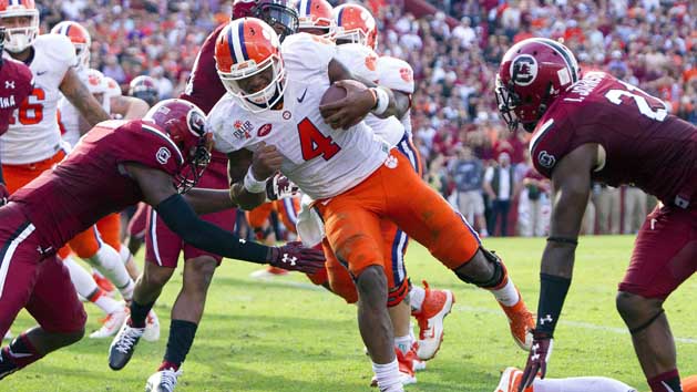 Sep 17, 2015; Louisville, KY, USA; Clemson Tigers quarterback Deshaun Watson (4) looks to throw against the Louisville Cardinals during the second quarter at Papa John's Cardinal Stadium. Mandatory Credit: Jamie Rhodes-USA TODAY Sports