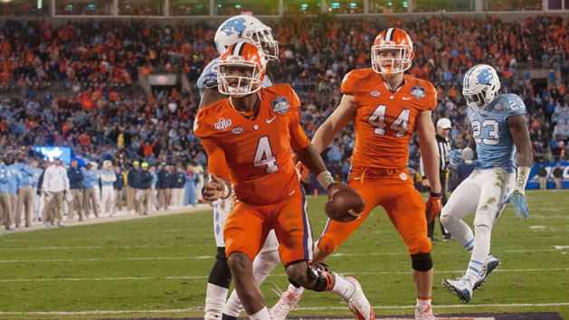Dec 5, 2015; Charlotte, NC, USA; Clemson Tigers quarterback Deshaun Watson (40 scores a touchdown in the fourth quarter against the North Carolina Tar Heels in the ACC football championship game at Bank of America Stadium. Mandatory Credit: Jeremy Brevard-USA TODAY Sports