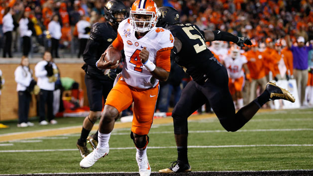 Nov 19, 2016; Winston-Salem, NC, USA; Clemson Tigers quarterback Deshaun Watson (4) runs in for a touchdown during the second quarter against the Wake Forest Demon Deacons at BB&T Field. Photo Credit: Jeremy Brevard-USA TODAY Sports