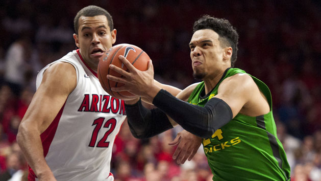 Jan 28, 2016; Tucson, AZ, USA; Oregon Ducks forward Dillon Brooks (24) drives to the basket as Arizona Wildcats forward Ryan Anderson (12) defends during the first half at McKale Center. Mandatory Credit: Casey Sapio-USA TODAY Sports