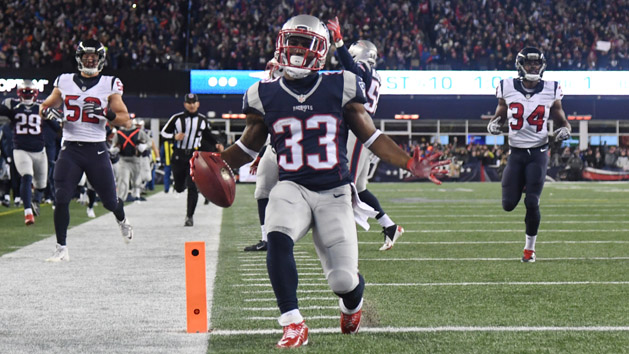 Jan 14, 2017; Foxborough, MA, USA; New England Patriots running back Dion Lewis (33)returns a kick for a touchdown against the Houston Texans during the first quarter in the AFC Divisional playoff game at Gillette Stadium. Photo Credit: James Lang-USA TODAY Sports