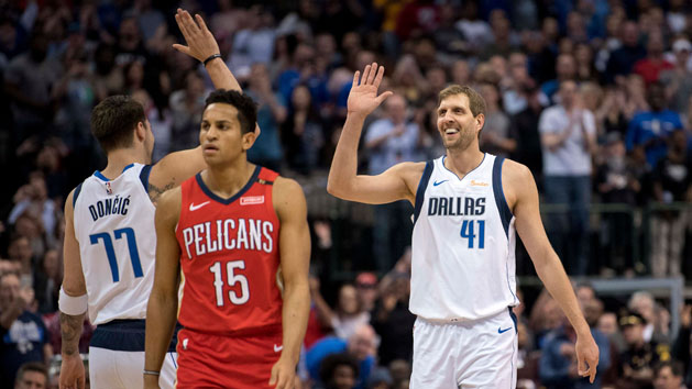 Mar 18, 2019; Dallas, TX, USA; Dallas Mavericks forward Luka Doncic (77) and forward Dirk Nowitzki (41) celebrate Nowitzki becoming the sixth all-time leading scorer in NBA history during the first quarter against the New Orleans Pelicans at the American Airlines Center. Photo Credit: Jerome Miron-USA TODAY Sports